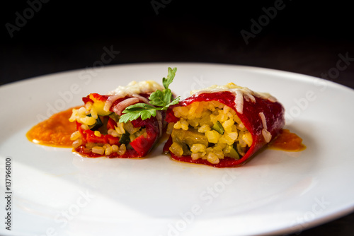 Red peppers stuffed with rice and vegetables