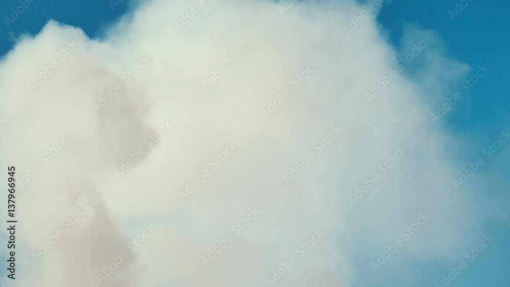 White smoke or cloud on clean blue sky. Ideally for background. Abstract concept. White smoke or cloud on clean blue sky. Ideally for background. Abstract concept.
