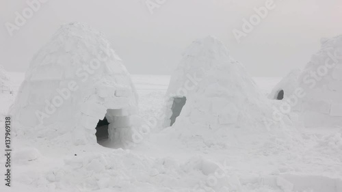 Igloo settlement in Siberia tundra. photo