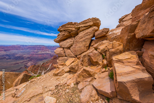 Huge stones on the edge of a precipice. South Kaibab Trail, Grand Canyon. 