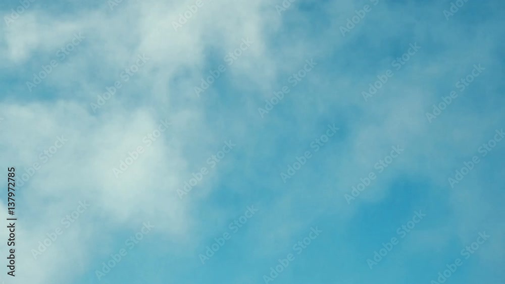 White smoke or cloud on clean blue sky. Ideally for background. Abstract concept. White smoke or cloud on clean blue sky. Ideally for background. Abstract concept.