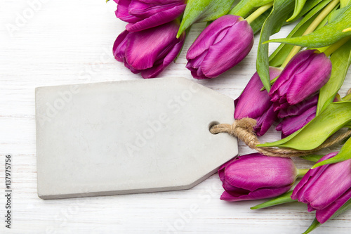 Fototapeta Naklejka Na Ścianę i Meble -  Tulip bouquet on white wooden background, copy space