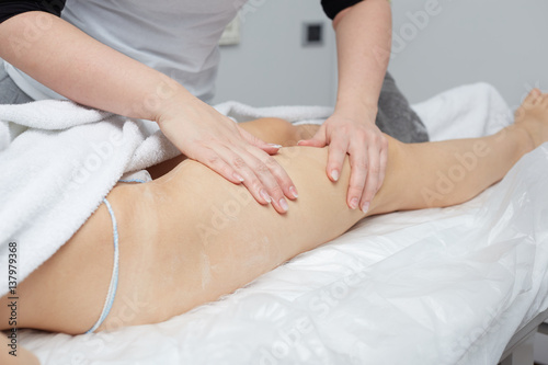 legs and buttocks massage to reduce cellulite and preserve an healthy look