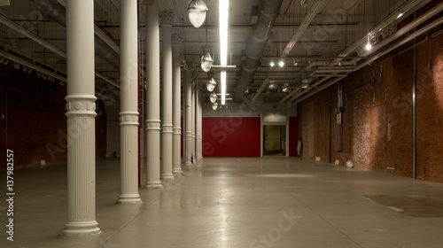 Interior of empty retail unit at night