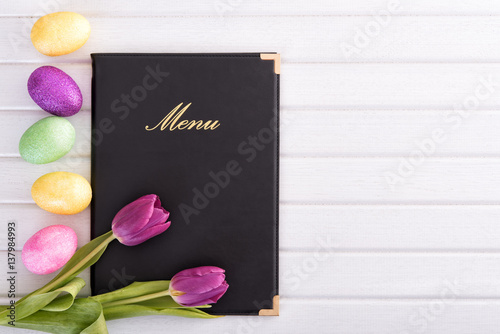 Menu with fresh flowers and easter eggs