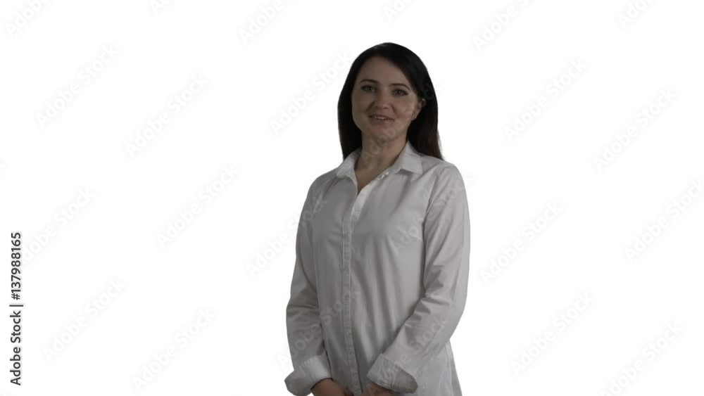 Brunette business woman in white shirt talking on white background presenting something. 4k footage PNG with alpha channel. Brunette business woman in white shirt talking on white background presenting something. 4k footage PNG with alpha channel.