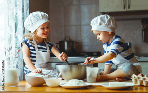 happy family funny kids bake cookies in kitchen