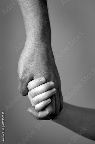 Adult Holding Hand of a Child Family Love