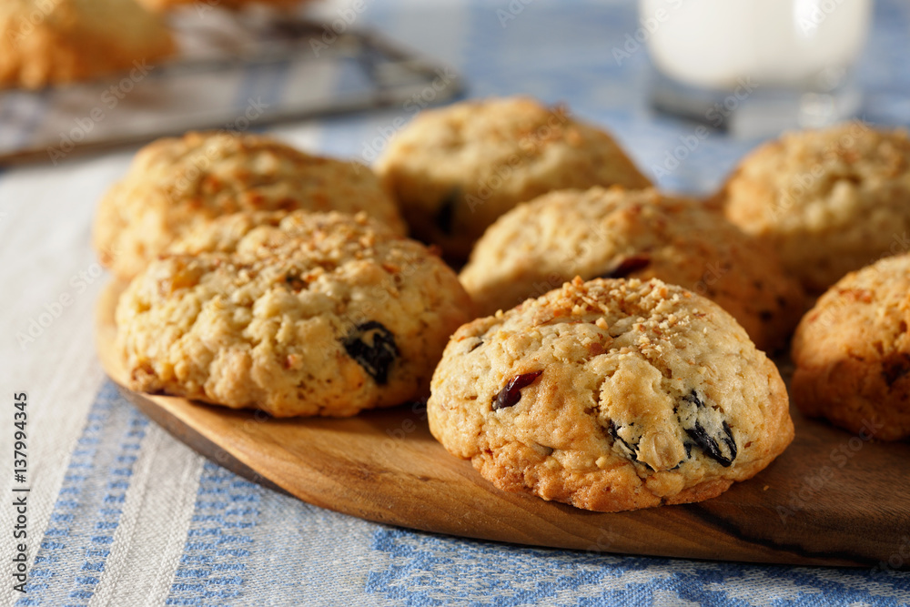Homemade biscuit with a cup of milk, close view. Homemade biscuit with a cup of milk, close view.