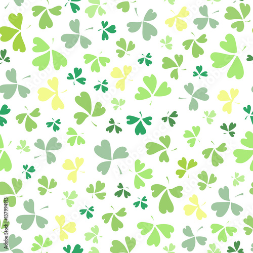 Abstract doodle seamless St Patrick's day background decorated with shamrock leaves. Wrapping paper design, banner