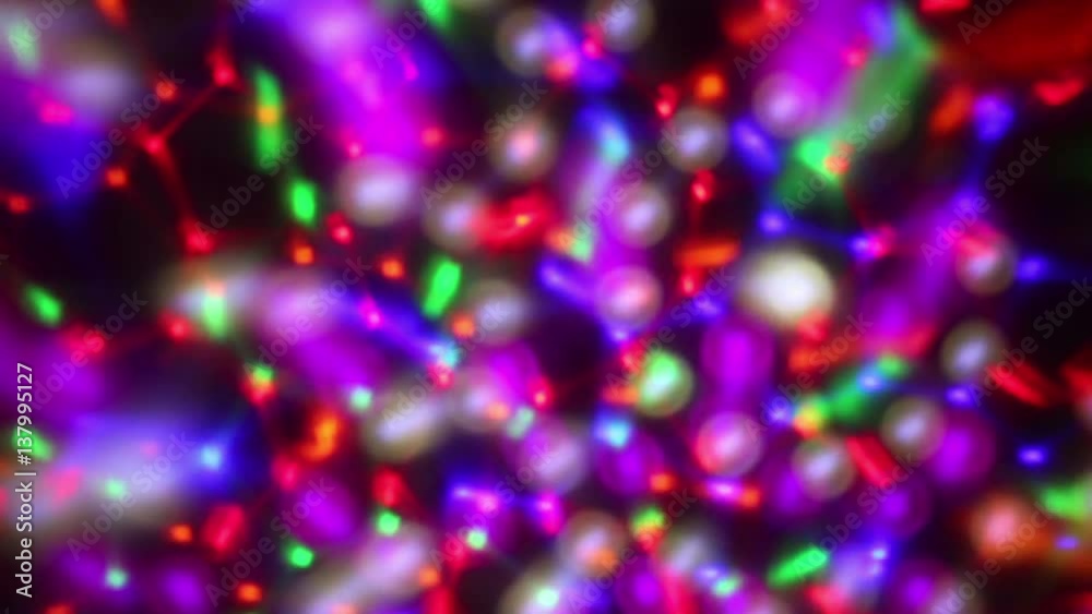 Moving multicolor projector spot lights on wall, HD 1080i
