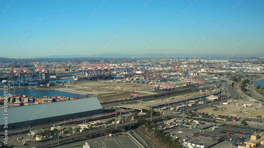 Shipyard Aerial v25 Flying low over large shipyard panning with Long Beach cityscape views. Shipyard Aerial v25 Flying low over large shipyard panning with Long Beach cityscape views.