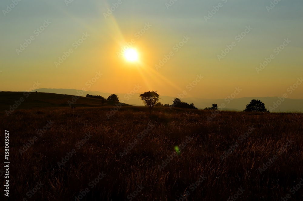 Naklejka premium Landscape with mountain and sunshine