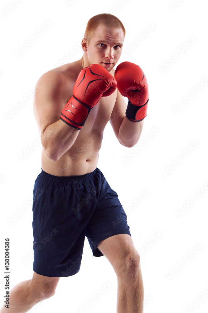 Full length portrait of young male boxer flexing muscles isolated over white background Full length portrait of young male boxer flexing muscles isolated over white background