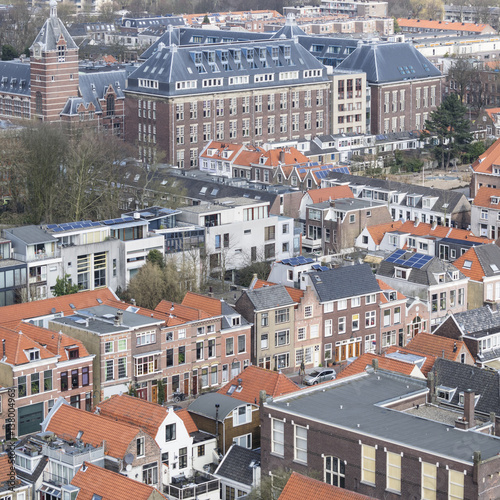 Vintage tiled roofs in the old downtown of Delft, Netherlands in the beginning of spring. photo