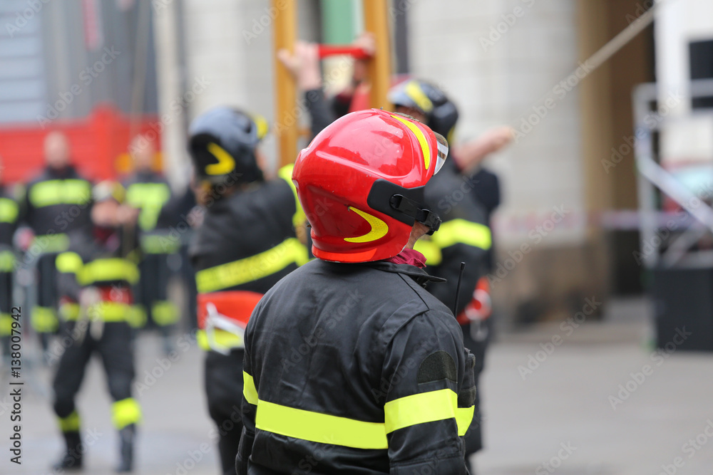 firefighter with hardhat during outdoor exercise firefighter with hardhat during outdoor exercise