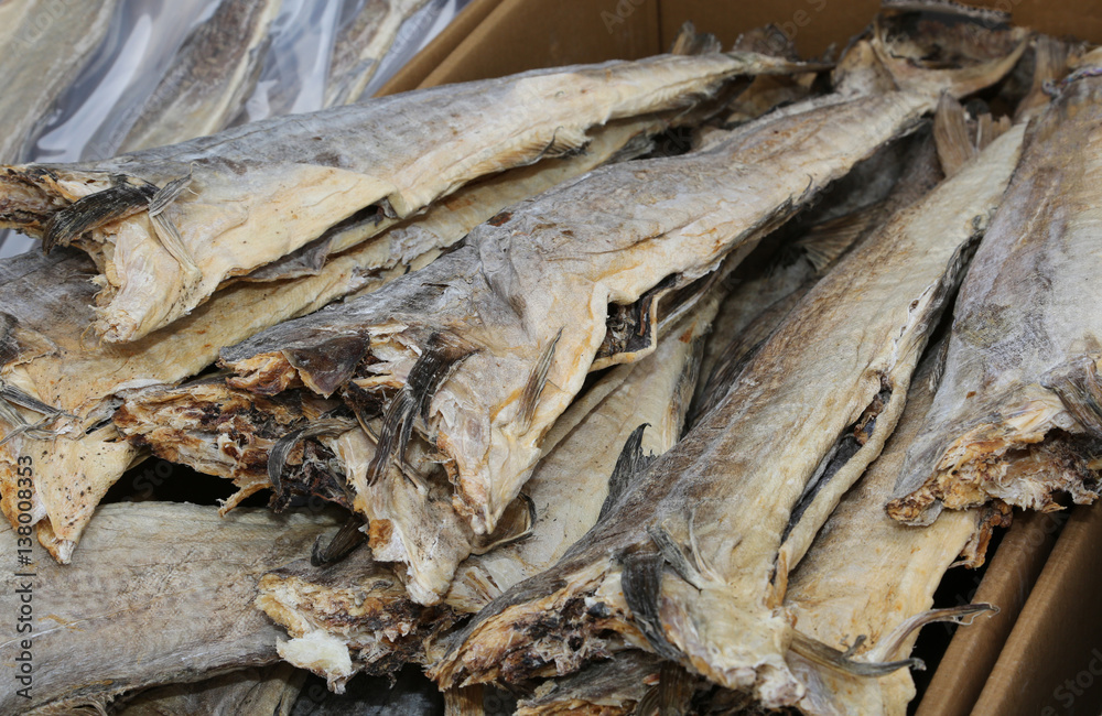 Smoked Stockfish  cod fish dried for sale in the fish market in