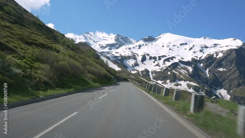 Driving Grossglockner Hochalpenstrasse (High Alpine Road) at around 1800m elevation in Salzburgland, Austria. Note: Visible glare.