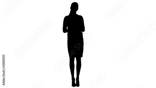 Silhouette Serious female manager talking to camera ticking off on her fingers 