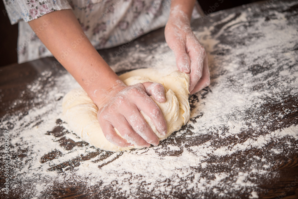 Knead dough with hands Knead dough with hands