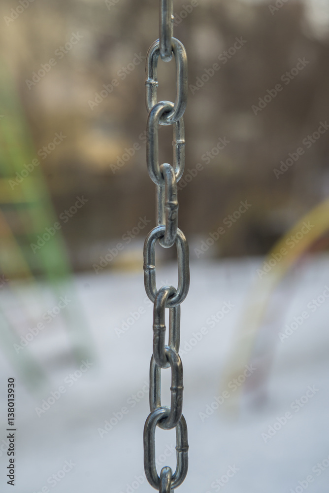 metal chain close-up on a snow background