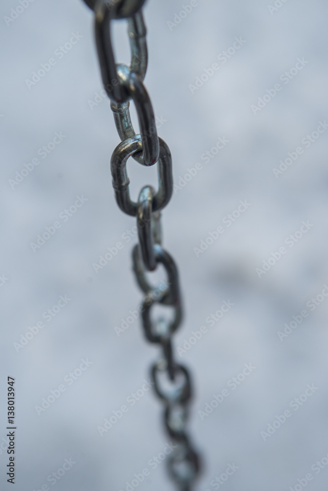 metal chain close-up on a snow background metal chain close-up on a snow background