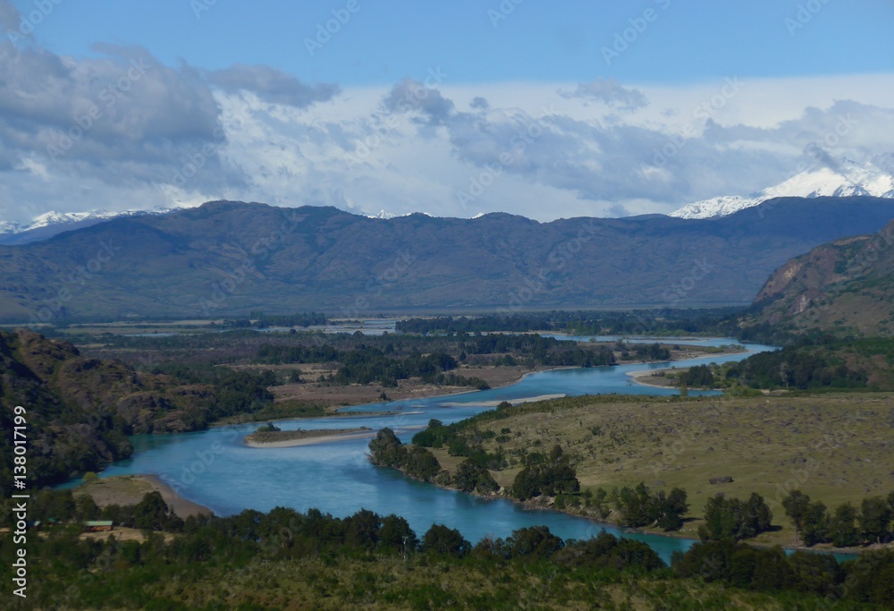 Turquoise river meandering its way through the stunning mountains. Turquoise river meandering its way through the stunning mountains.