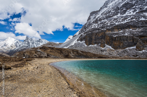 Mountain trail in Yading-China. Path along the ridge leading to summit