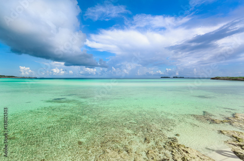 Nice beautiful inviting view of turquoise tranquil ocean and blue sky background at Cayo Guillermo island  Cuba on sunny gorgeous day 