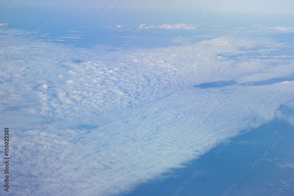 white fluffy clouds in the blue sky white fluffy clouds in the blue sky