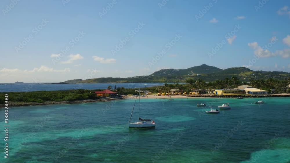 St Maartin Aerial v50 Flying low over Orient Bay panning. St Maartin Aerial v50 Flying low over Orient Bay panning.