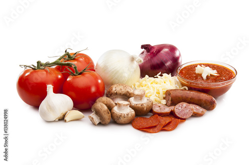 Pizza fixings on white