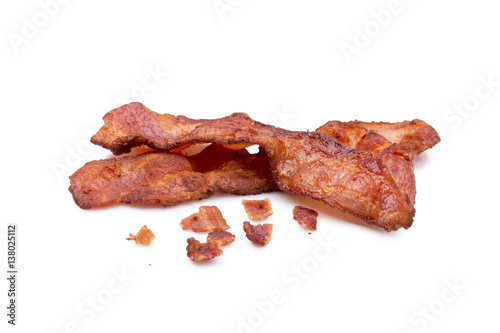  Strips of bacon and bits on white