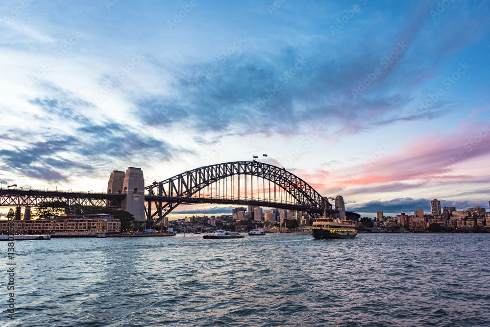 Australian iconic landmark Sydney Harbour Bridge against picturesque sunset sky Australian iconic landmark Sydney Harbour Bridge against picturesque sunset sky