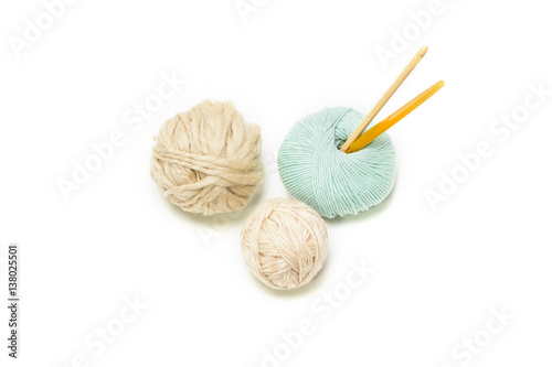 Mint and Light Brown yarns ball with crochet hook