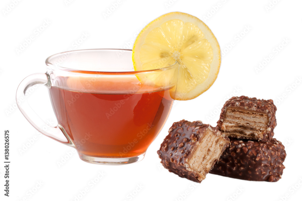 chocolate candy with a cup of tea isolated on white background
