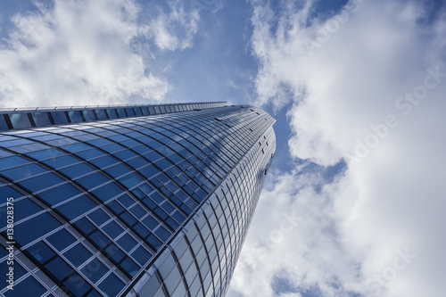 Skyscraper and Cloudy Sky photo