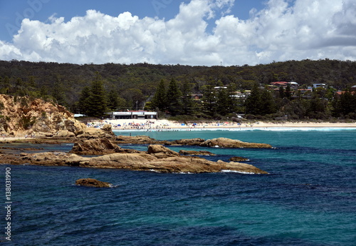 Tathra is a seaside village on the far south coast called the Sapphire Coast in the Bega Valley shire. Views from the rocky headland looking back towards Tathra beach. photo