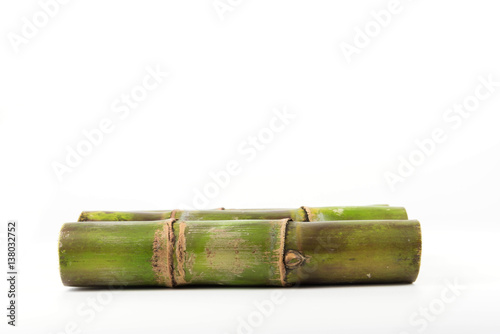 Close up of sugar cane in isolated white background