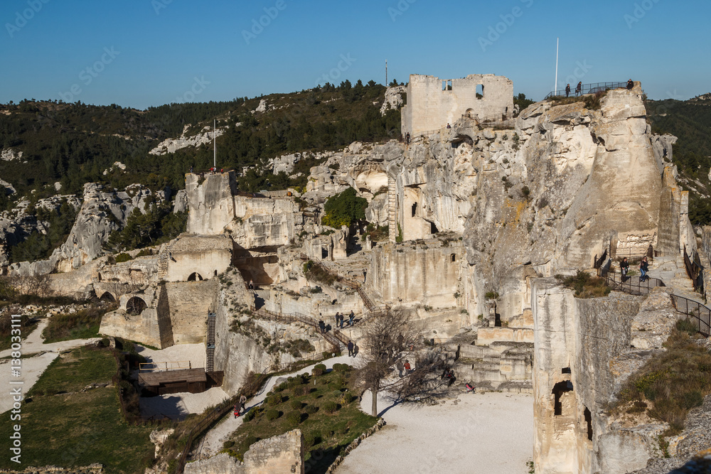 Ruins of the castle standing atop of picturesque village Les Baux-de-Provence, France