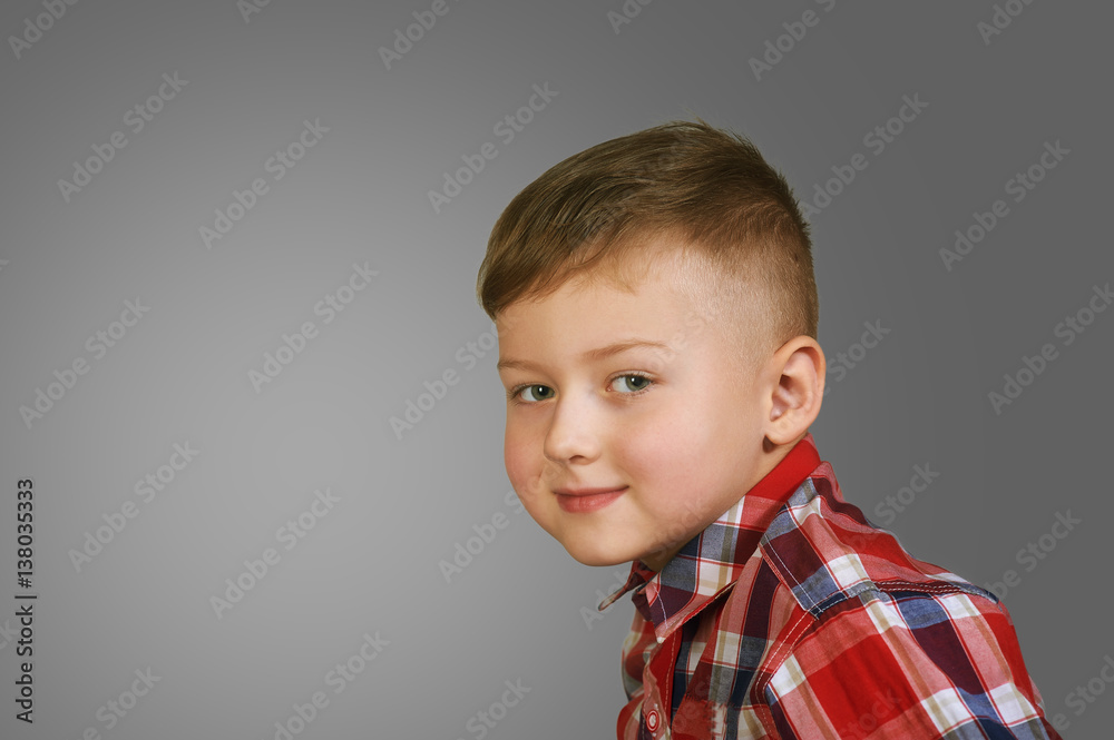 portrait of a beautiful boy . Stylish boy posing . the concept of children's fashion portrait of a beautiful boy . Stylish boy posing . the concept of children's fashion