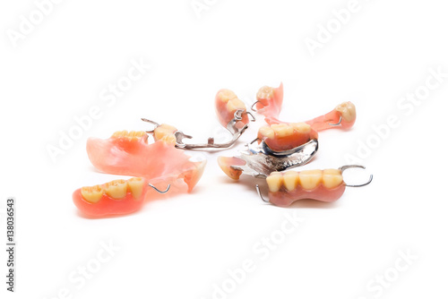 old man real denture with plastic type and stainless steal type.