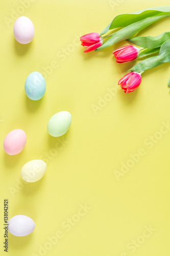 Easter concept on yellow background top view mockup