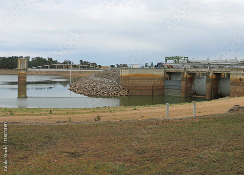 BARINGHUP, VICTORIA, AUSTRALIA - cairn Curran Reservoir's intake tower, bridge and primary storage spillway photo