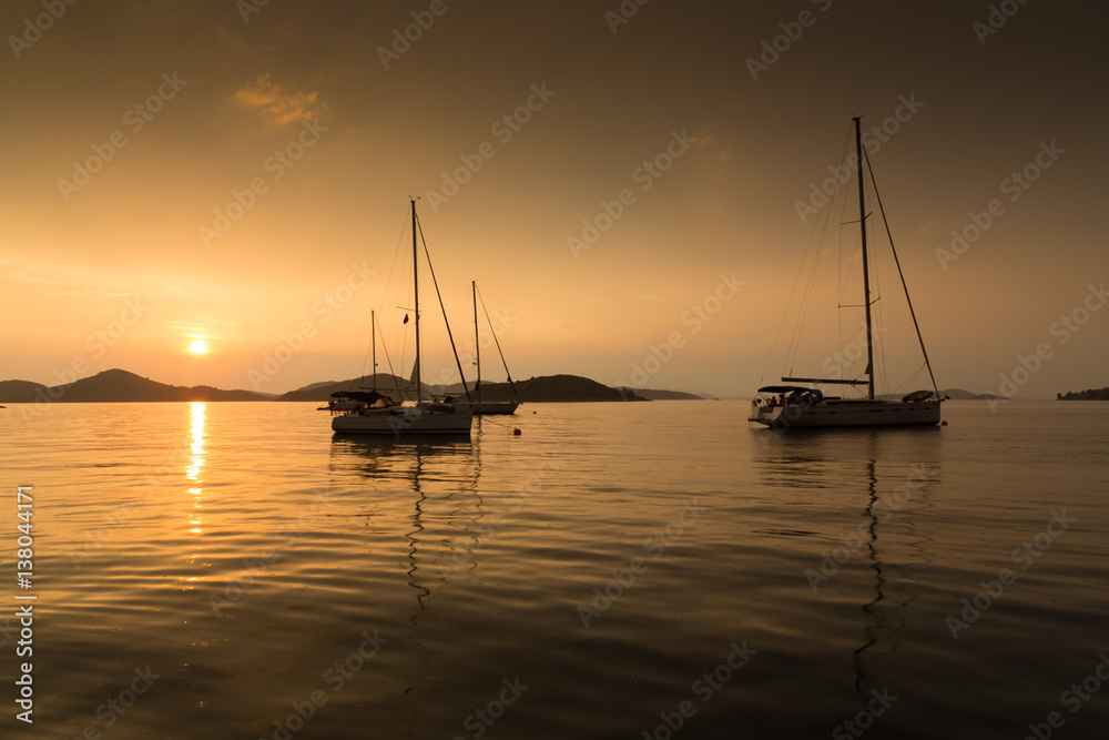 moored sailboats at sunset, Kornati, Croatia