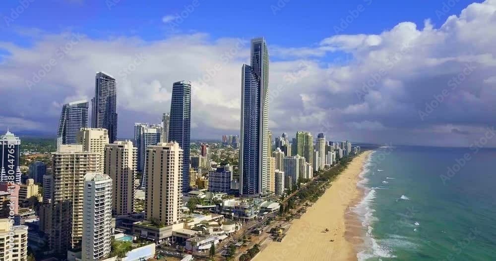 Aerial over ocean surf into the beach of Surfers Paradise Gold Coast Aerial over ocean surf into the beach of Surfers Paradise Gold Coast