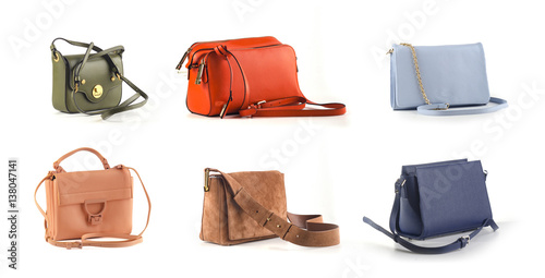group of women leather color handbags isolated on white background