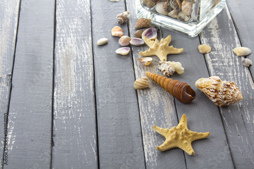 sea shells ocean stones rusty vintage wooden background 