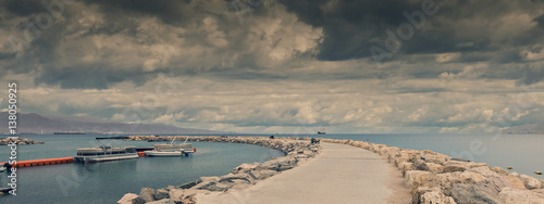 Walking stone pier in Eilat - the southernmost port and famous resort city in...