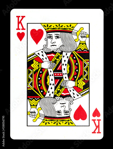 King of hearts playing card, isolated on black background. photo